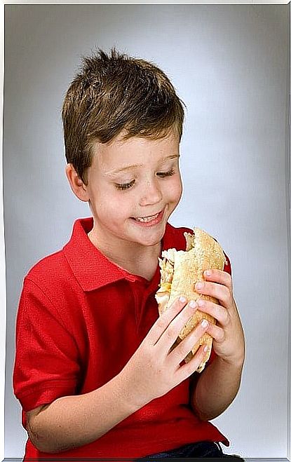 Children eat sandwich