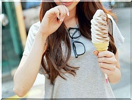 Woman eating ice cream.