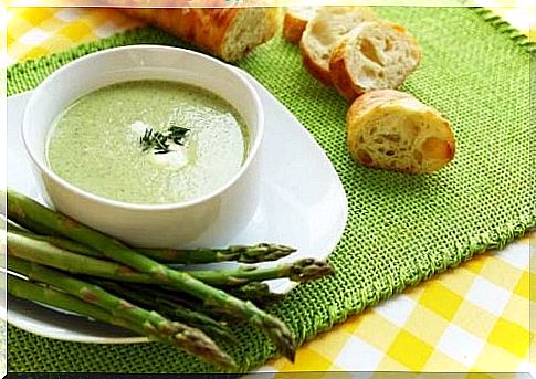 Asparagus soup with bread.