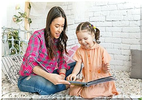 books that teach children about tolerance: mother reads to children