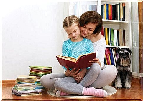 stimulate reading at home: mother and daughter reading