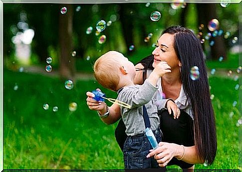 Mother and boy in park