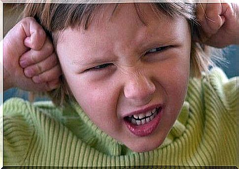 Stressed children cover their ears.