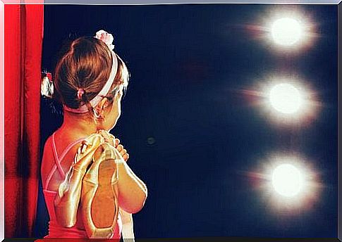 A child at a ballet performance.