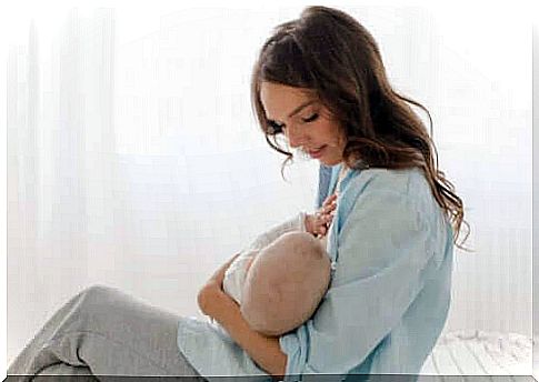 bioactive peptides: mother breastfeeds baby