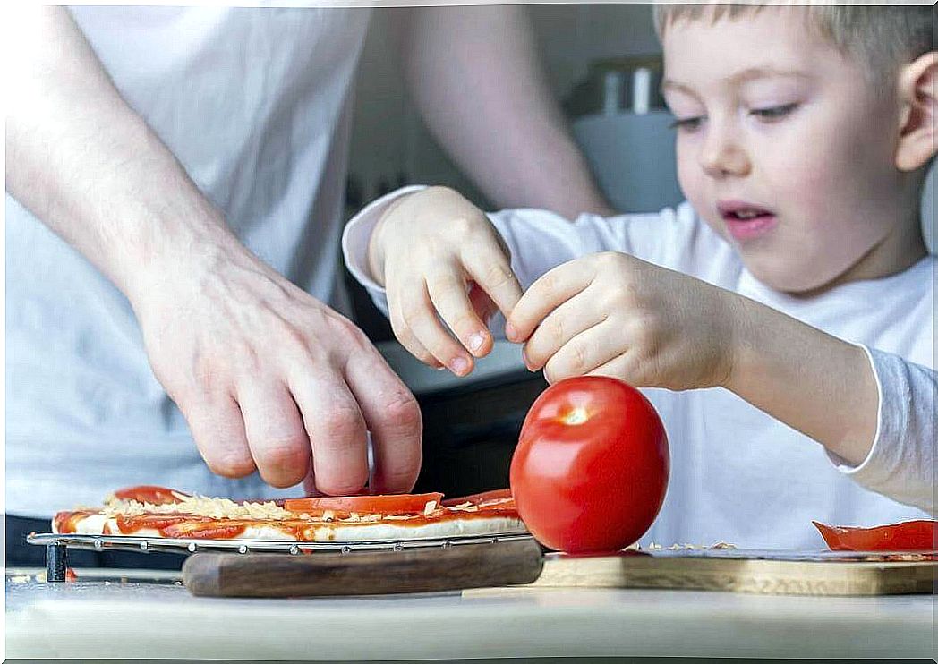 cooking activities for children: parent and child cook pizza