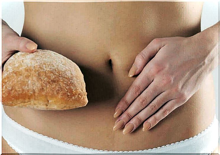 non-celiac gluten sensitivity: woman's stomach with bread