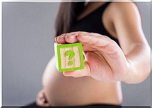 How many caesareans?  pregnant woman holding up question mark