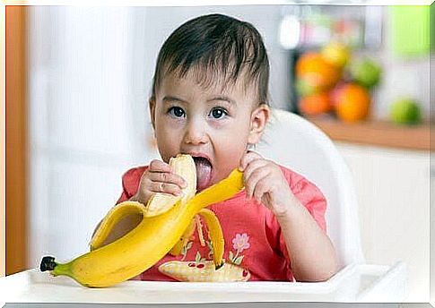 baby eats banana