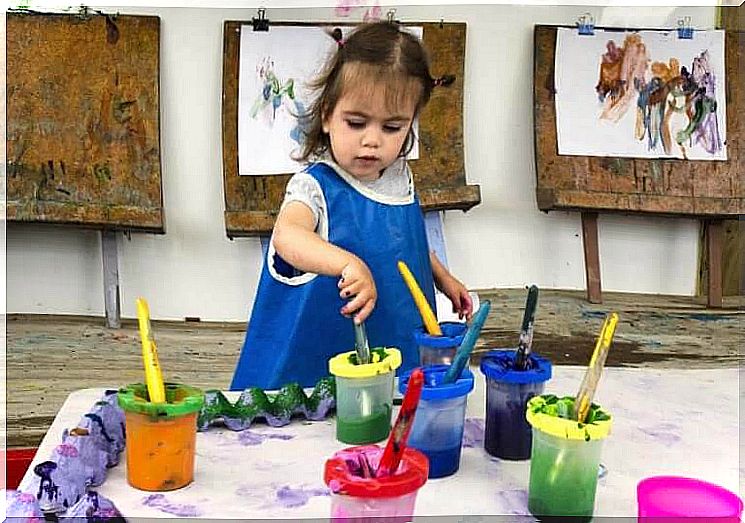 artistic talents: little girl with paint