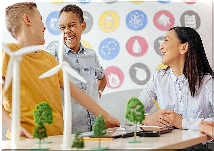 children talking and joking with architect