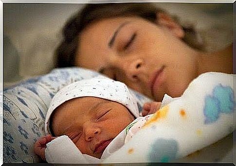 woman and baby sleeping