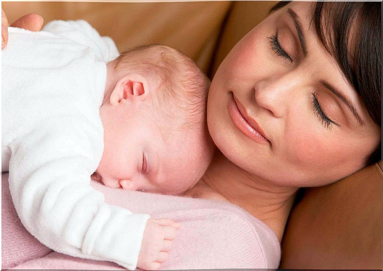 mom holding baby