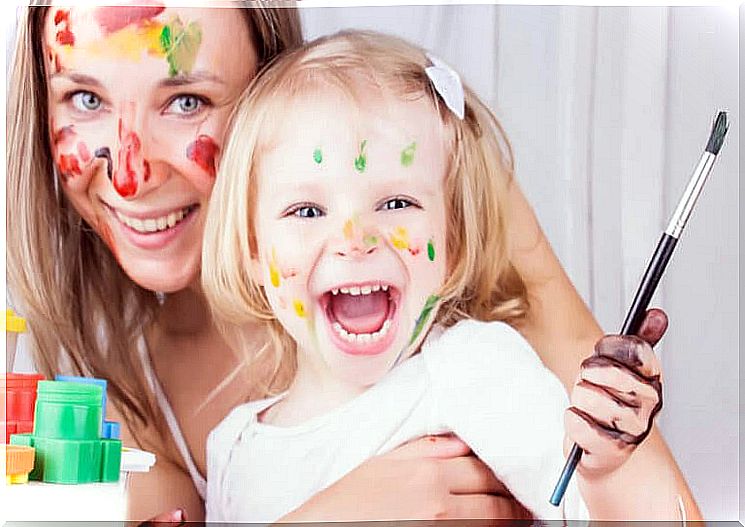 mother and daughter have painted their faces