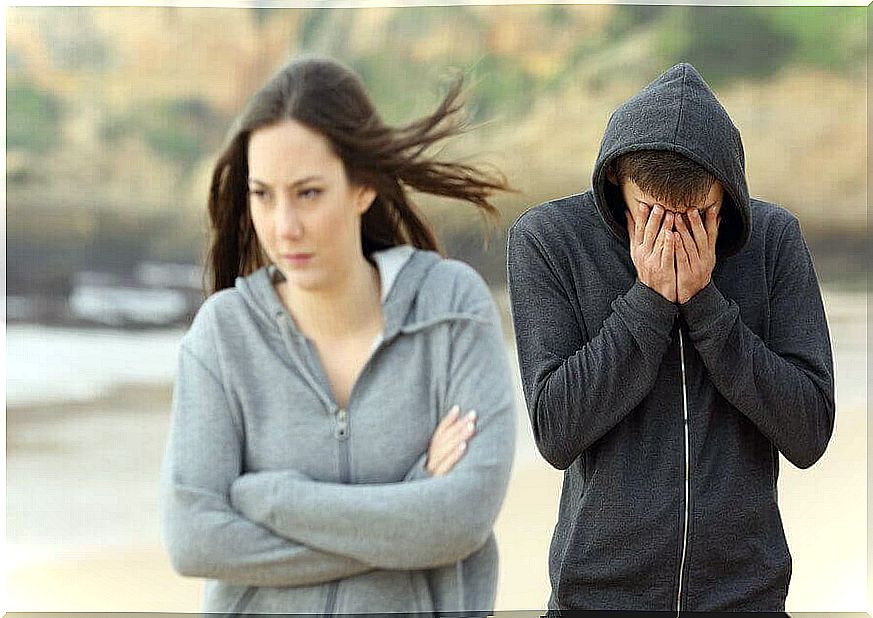 young man and woman look sad