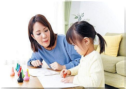 Au pair draws with children