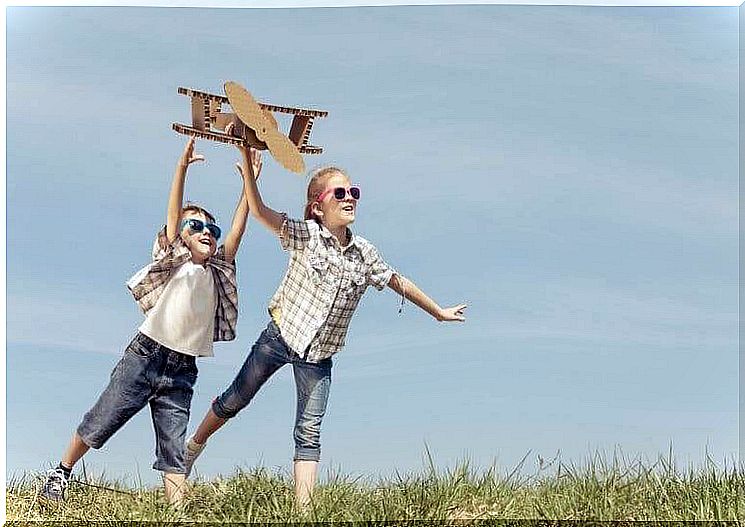 educate from a child's perspective: children play with toy airplanes