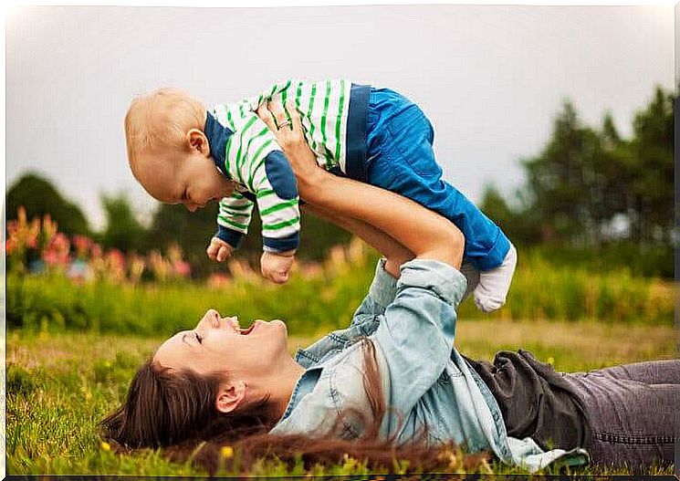 educate from a child's perspective: mother plays with baby