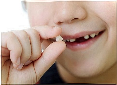 Boy who has lost a tooth.