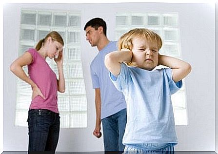 children cover their ears with parents arguing in the background