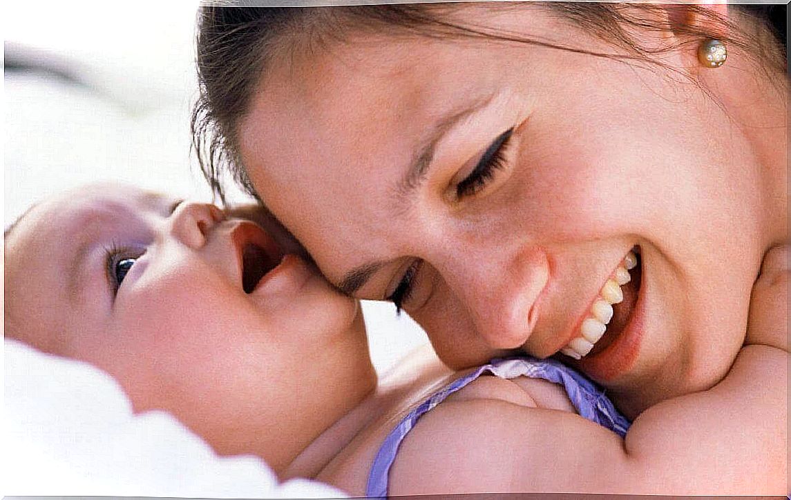 Mom smiles with children