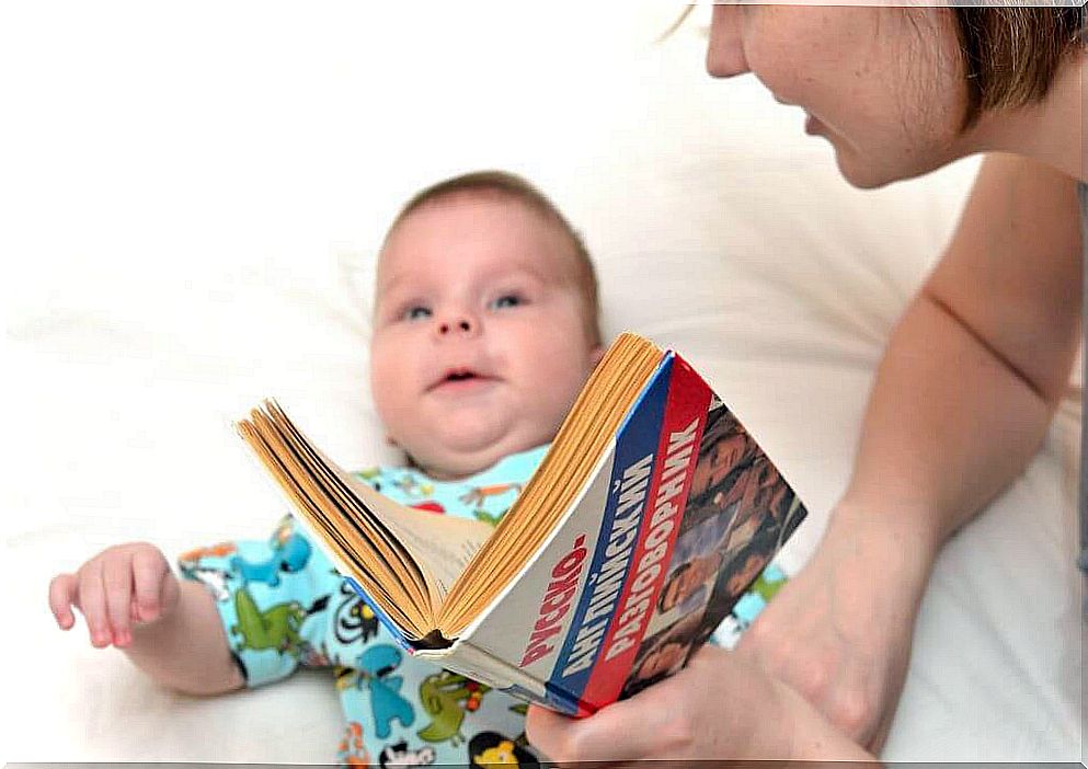 Mom reads to baby