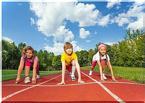 Three children are ready to run a race