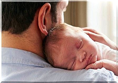 Baby in dad's arms